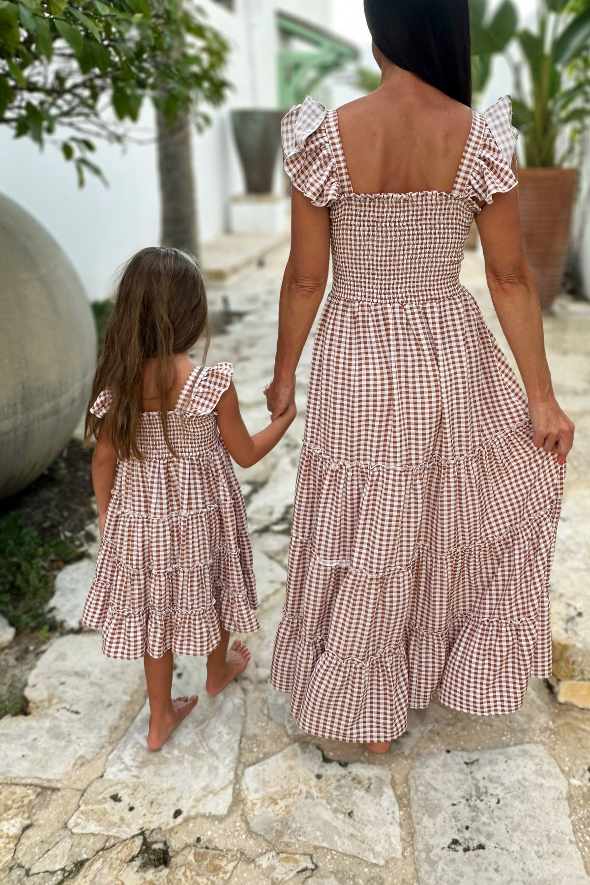fall gingham dress Hailey Brown L adjustable straps Front pockets Shirred panel in back Zipper in back Twirl through your weekend in our super cute Elderflower maxi dress Frankey Strapless Gingham Drop Waist