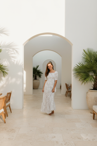 Elle's dress in minimal tropical resort