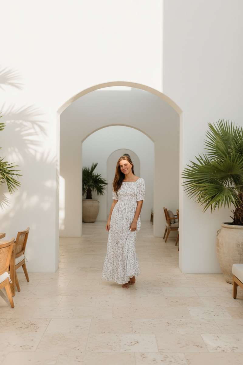 Elle's dress in minimal tropical resort