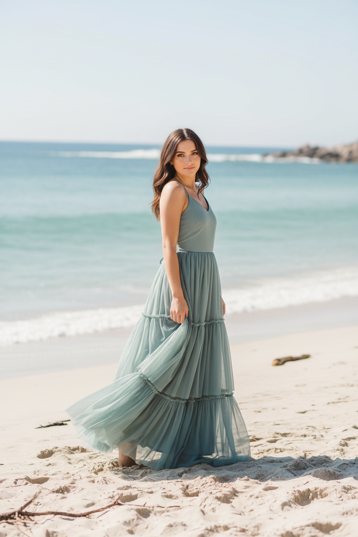 New model with ocean backdrop