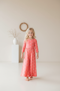 Rita Romper Pink Butterfly Studio Setting - Walking Pose